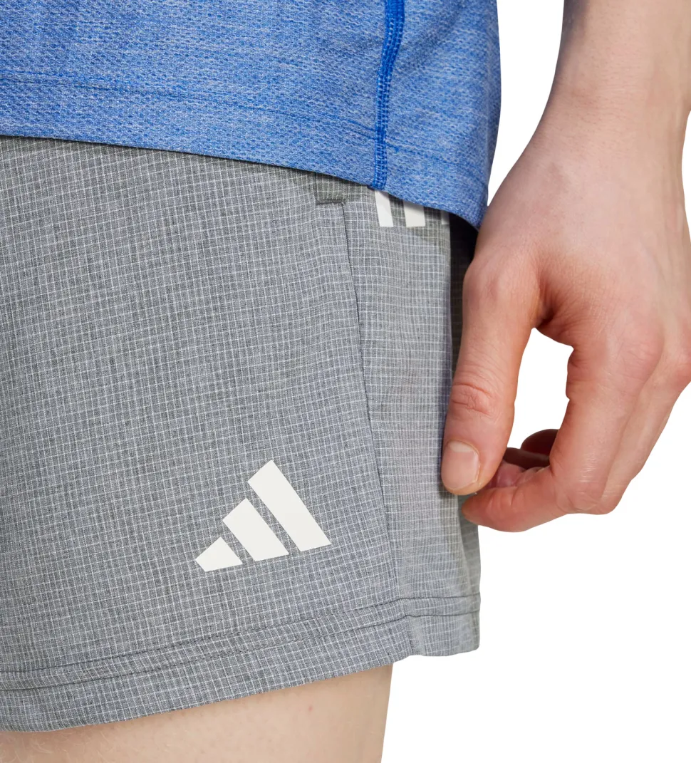 Own The Run Shorts 7" - Men's